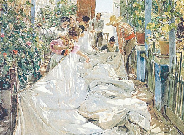 2. Cosiendo la vela.jpg